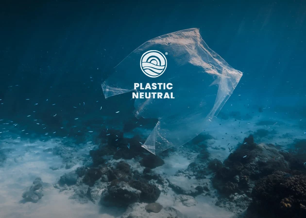 The Plastic Neutral certification badge over a photo of a discarded plastic bag floating underwater, with the text 'Plastic Neutral By Choice'